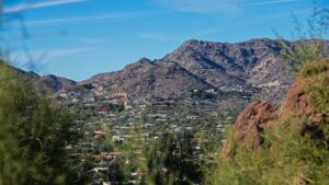 A picture of a mountain symbolizes the hump and head of a kneeling camel.